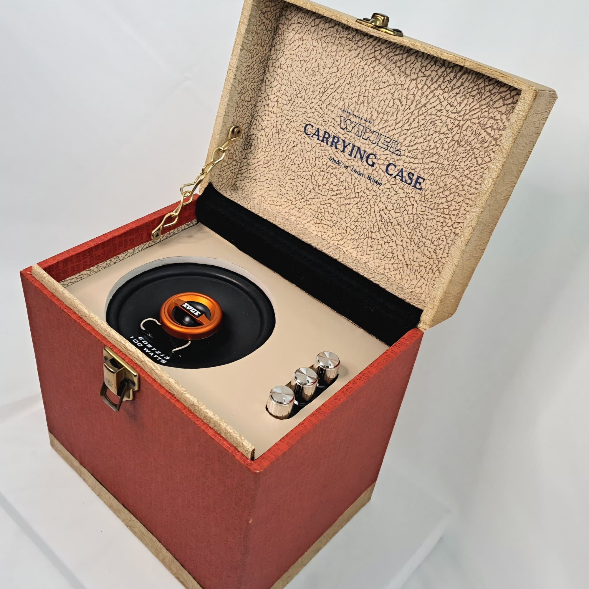 Red carrying case opened to show a driver mounted in the base