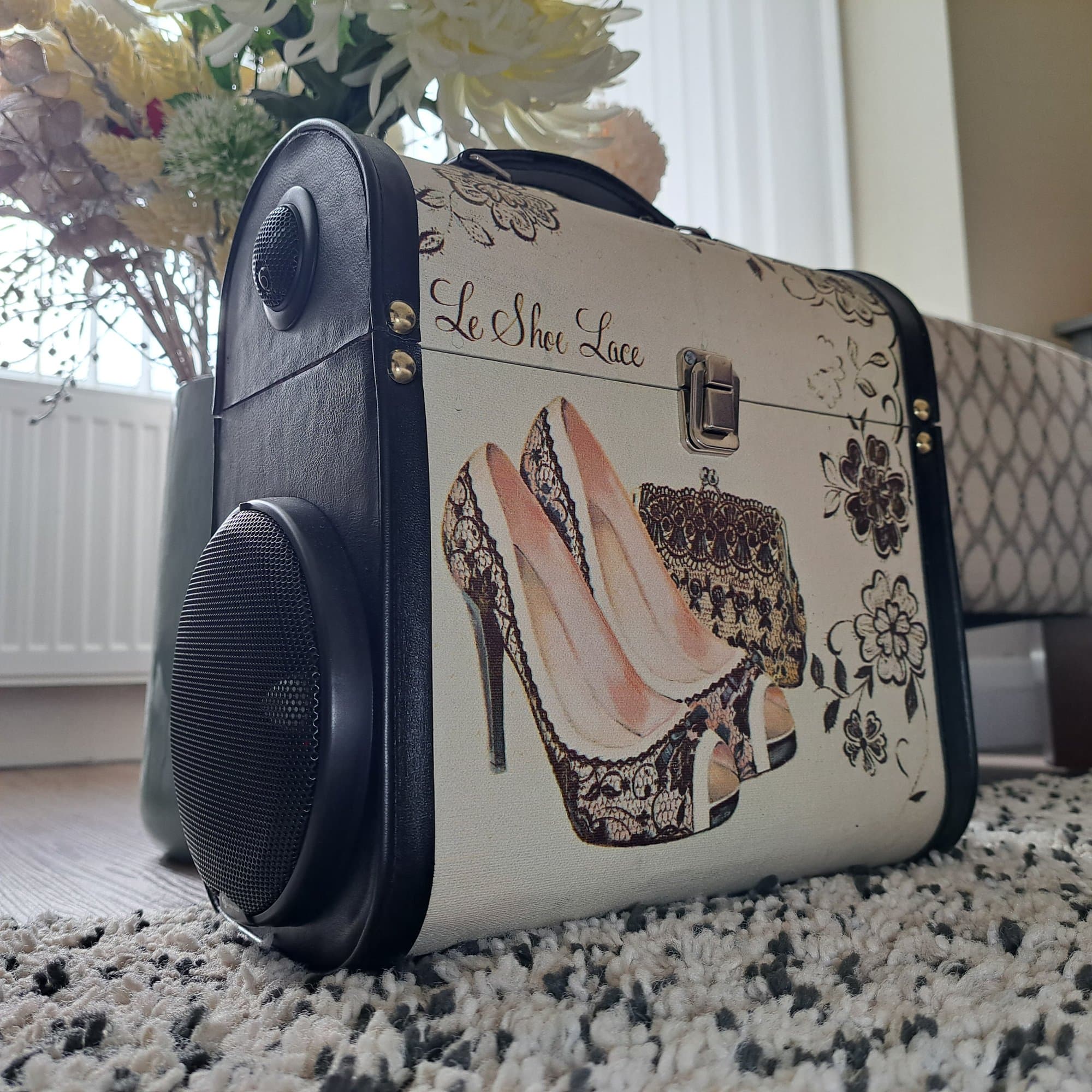 Bluetooth speaker built into a vintage vanity case decorated with lace heels